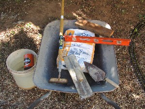 Tools used to mix and pour the concrete base
